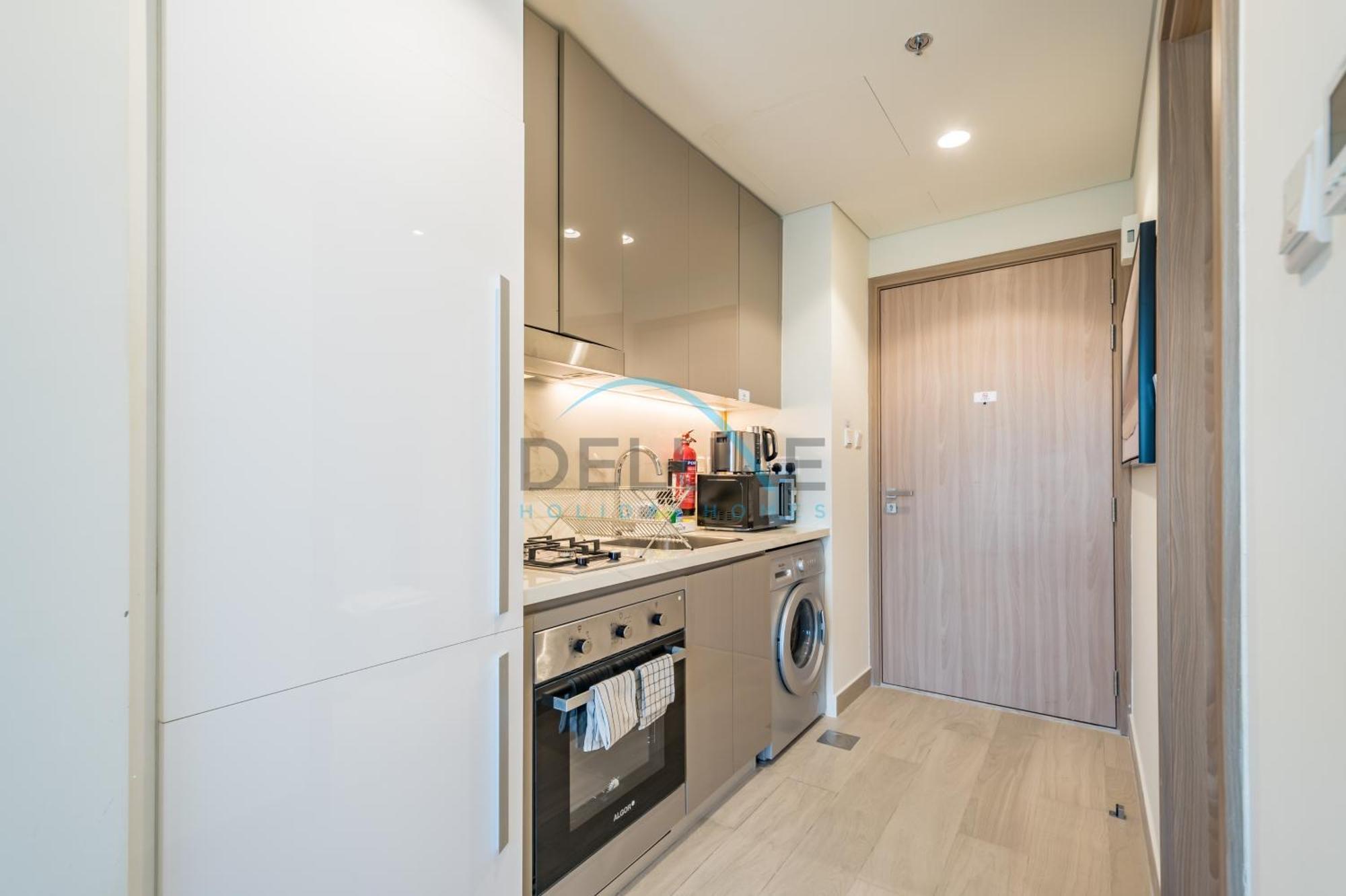 Relaxing At Azizi Riviera 46, Al Merkadh By Deluxe Homes Apartment